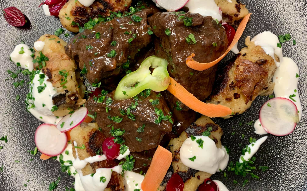 Tompos Restaurant offers beef shoulder "stew" with porcini dumplings.