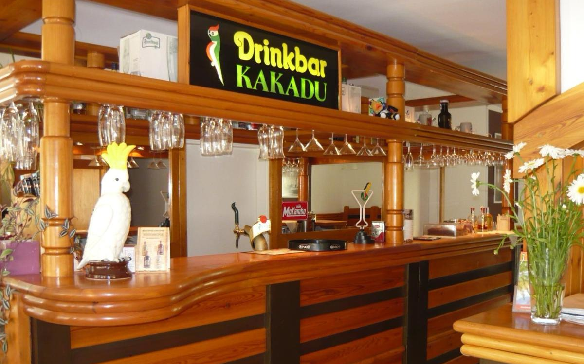 The KAKADU Wellness Hotel's drink bar is next to the reception desk.